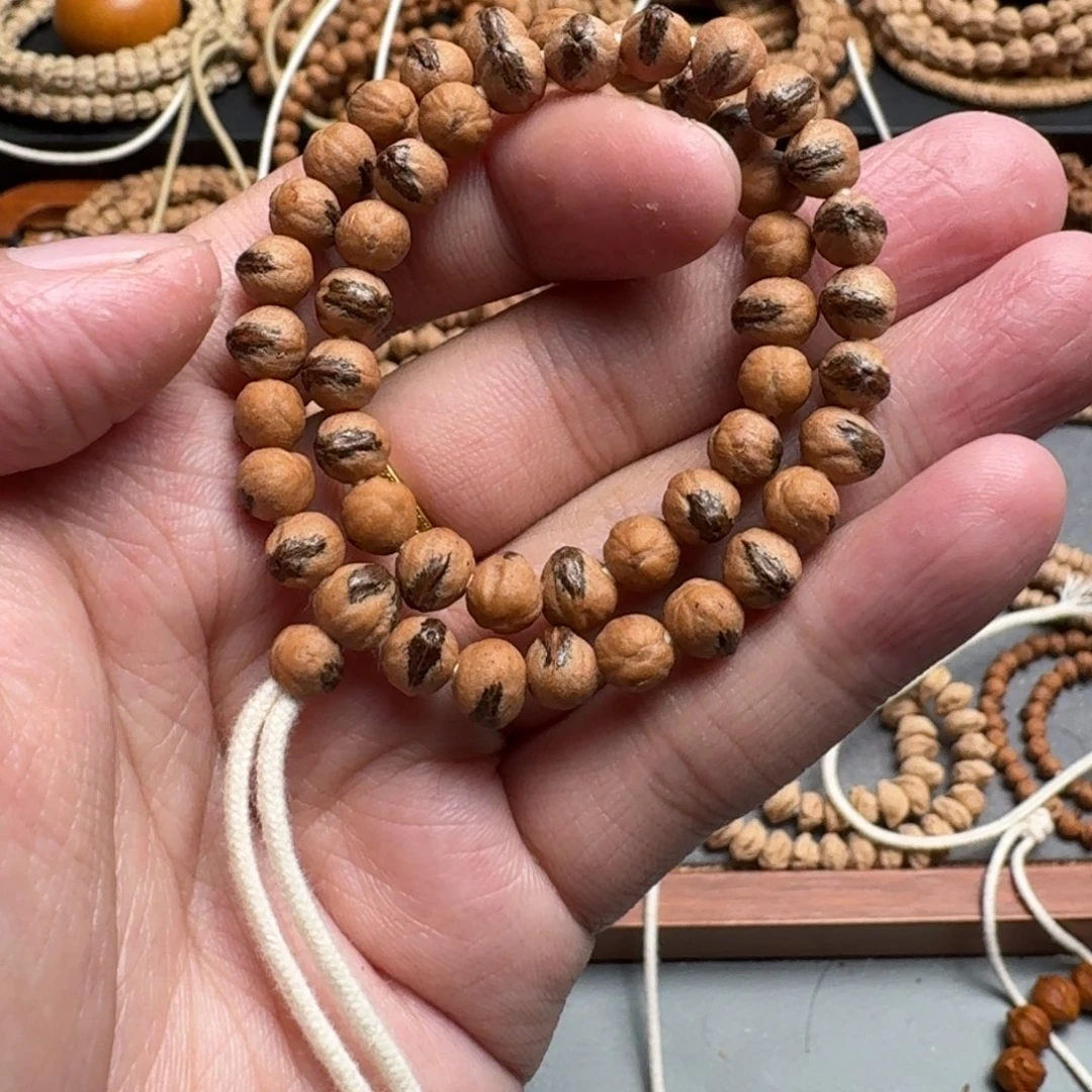 手串柏香籽/百香籽不*哥110