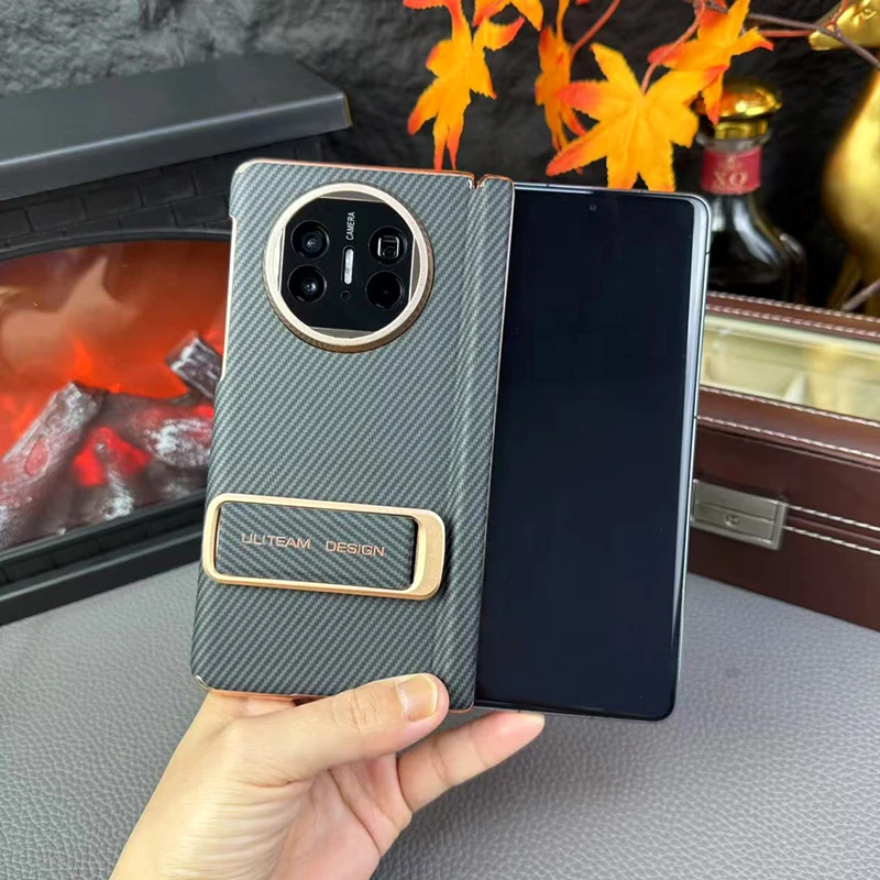 适用华为Matex5手机壳新款凯夫拉纹理双中轴腕带支架x5商务保护壳