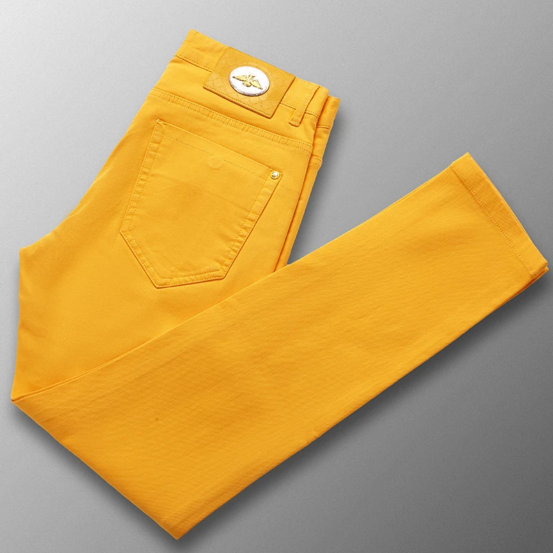 潮男炫彩黄色牛仔裤男2025春夏新款修身直筒小脚裤高街弹力男裤子