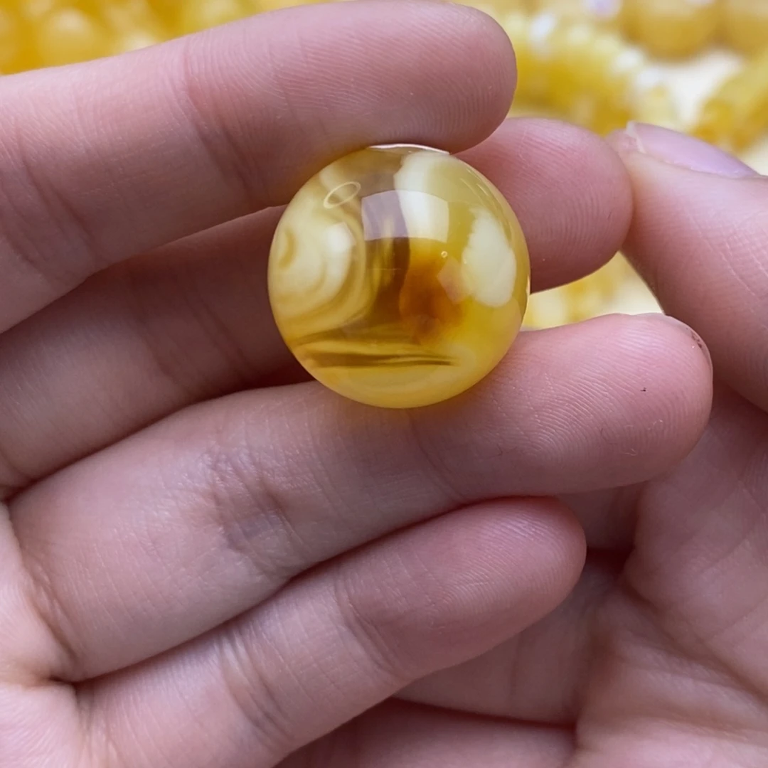 琥珀裸石未镶嵌难***。18.7圆珠