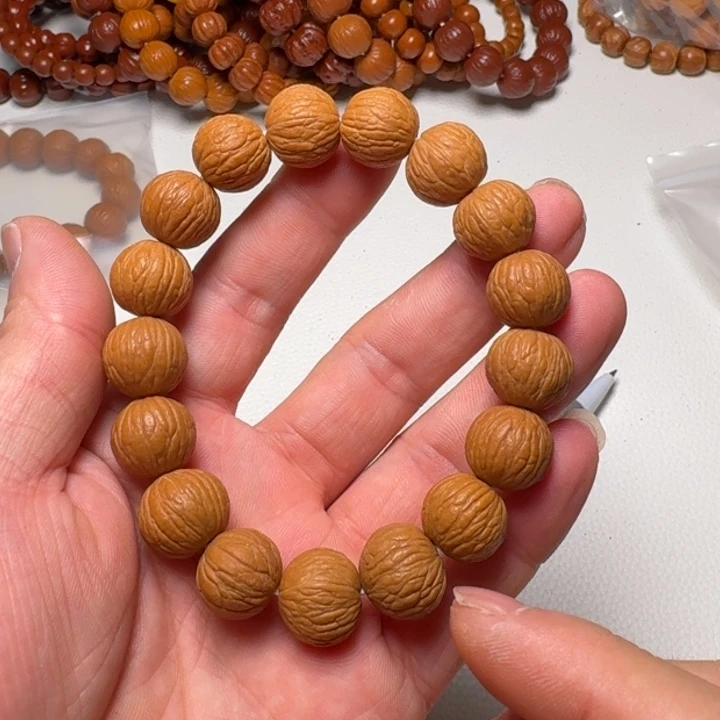 桃核手串半****生风雨手串