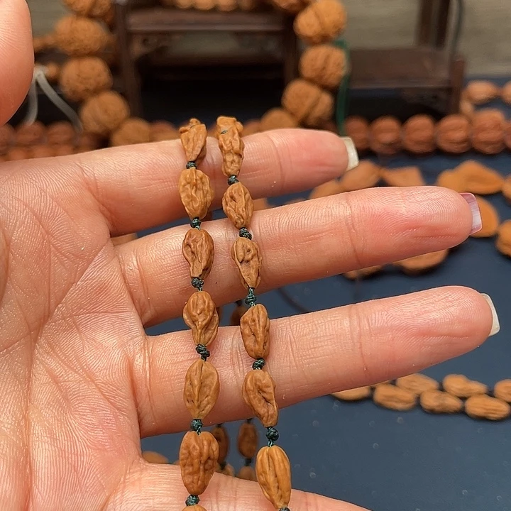 馒***丝吊坠桃核文玩，核桃