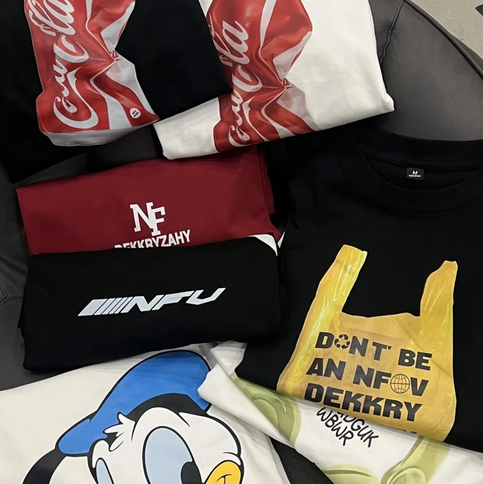 【001-1000诗琪】圆领卡通短袖印花日常宽松型T恤宽松打底美式