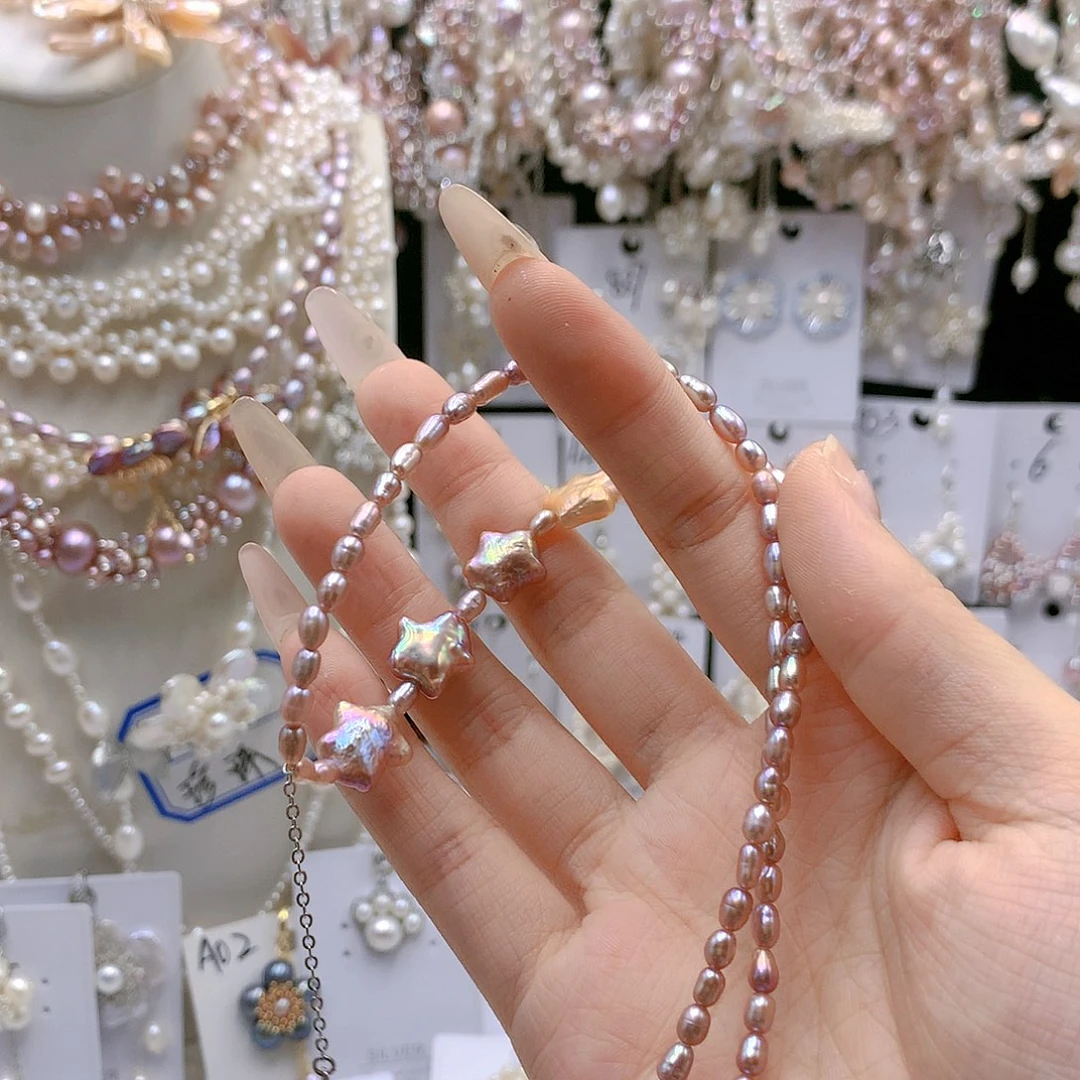 银S925镶嵌耳饰淡水珍珠在***奔