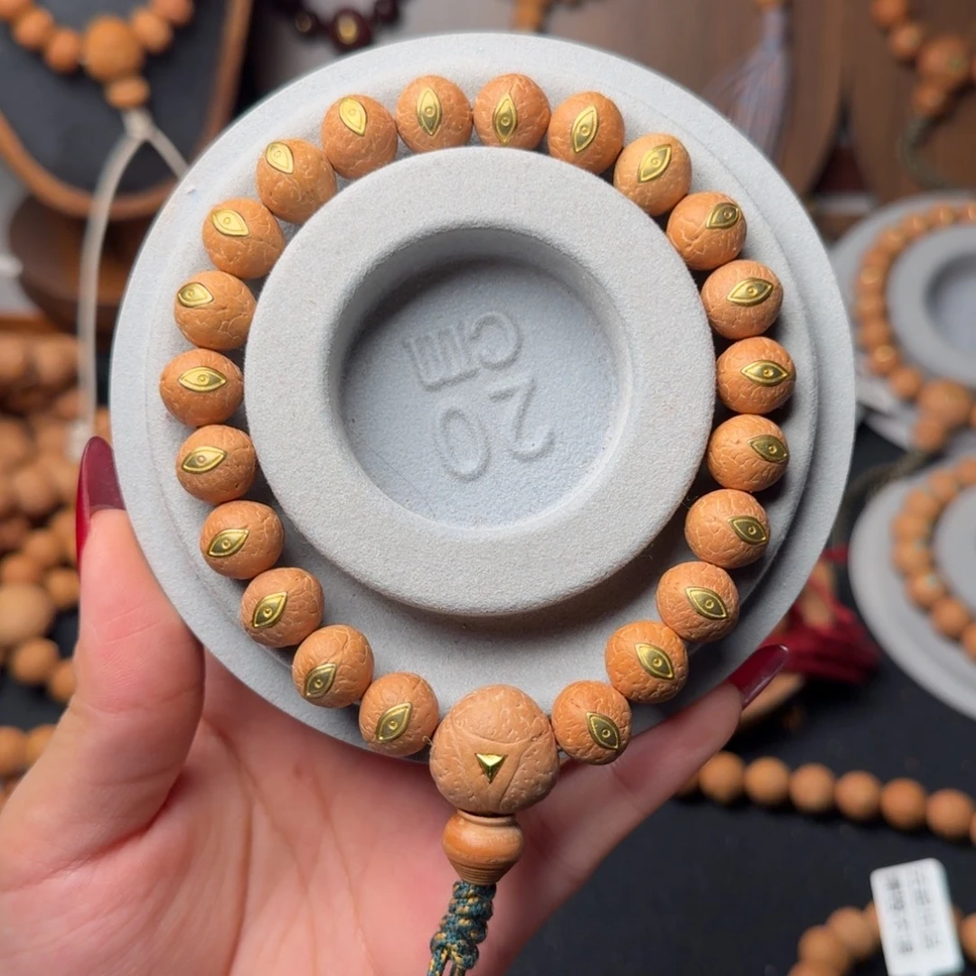 把件凤眼菩提11.5铜法螺眼