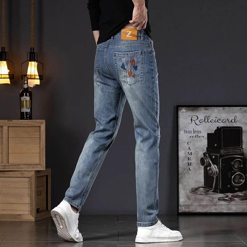 高端痞帅复古牛仔裤男士早秋新款潮牌弹力修身小脚裤直筒长裤子男