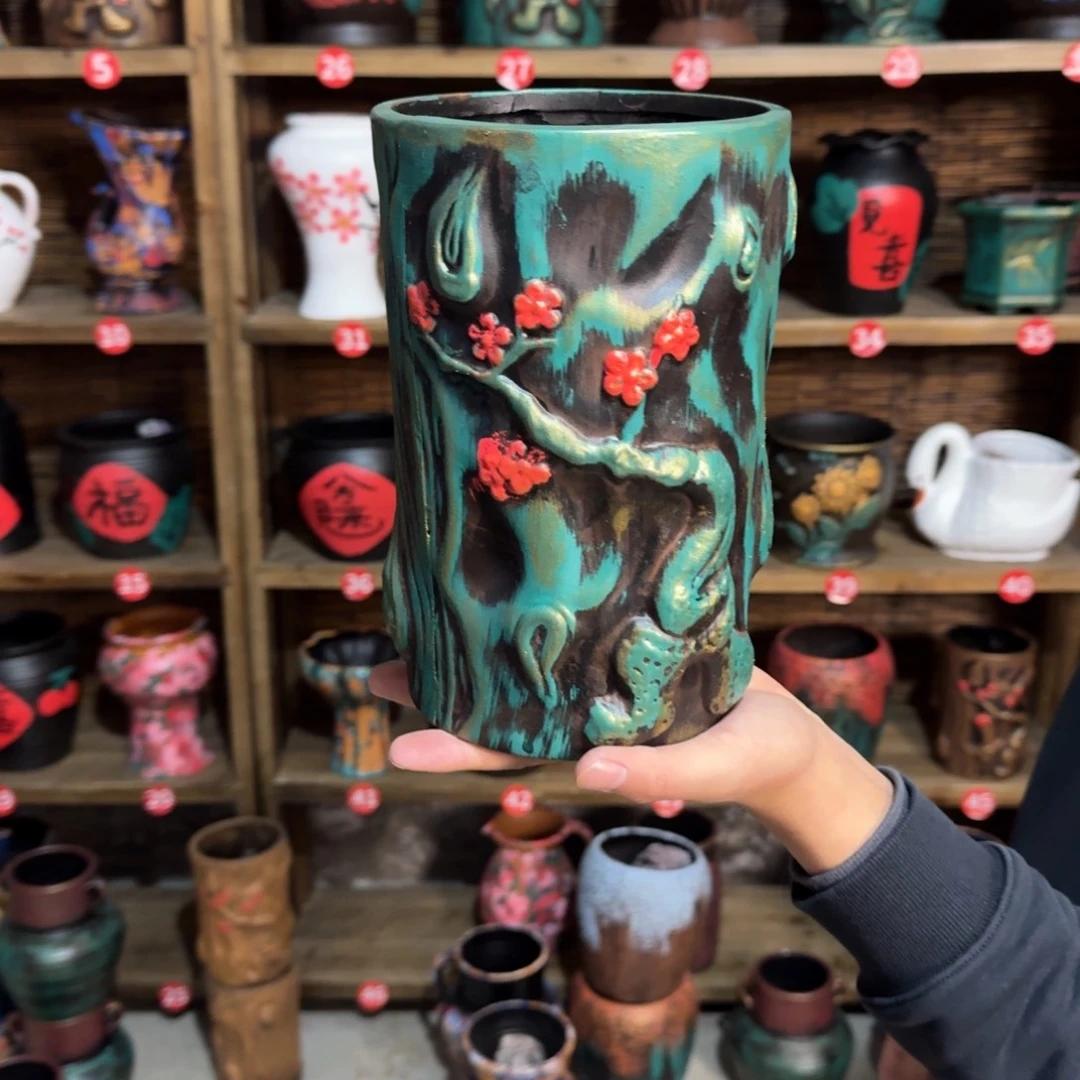 有孔红陶浮雕花盆炸炸炸