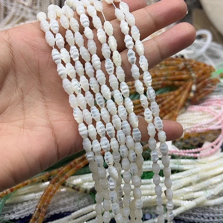玛瑙/玉髓未镶嵌珠宝半成品一条5/9mm左右白蝶贝雕刻