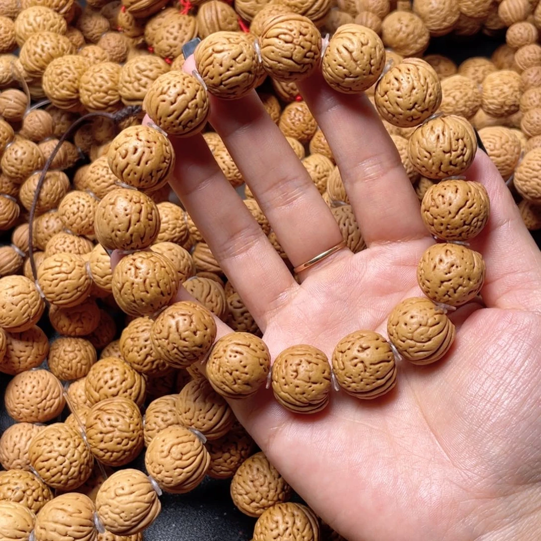 I***.手串桃核元宝手串