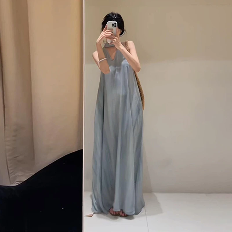 蓝色无袖吊带雪纺连衣裙子女夏季2025新款海边度假纯欲慵懒风女装