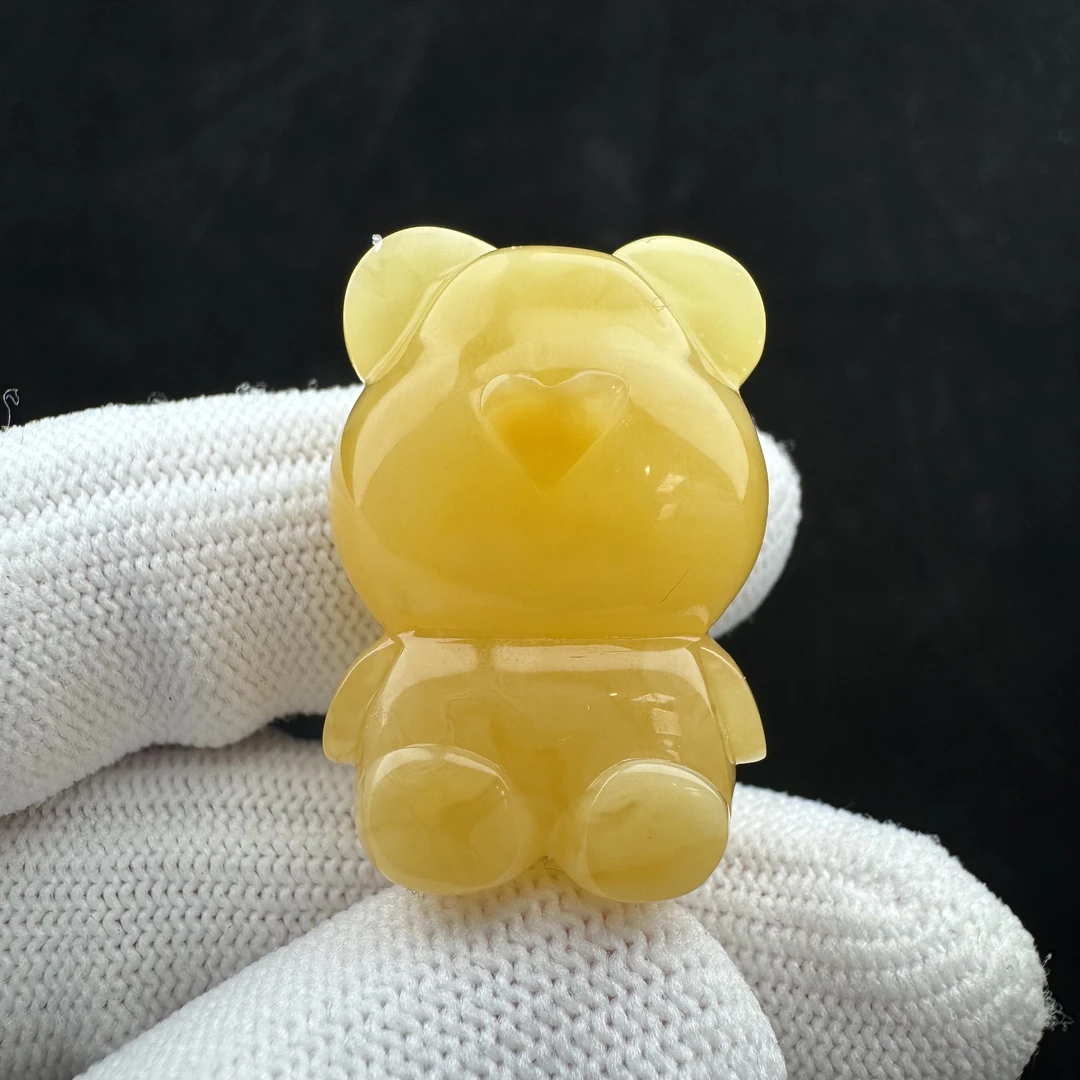 Y5783天然原矿蜜蜡 小熊牛鼻孔20*30*15mm 一图一物假一罚十
