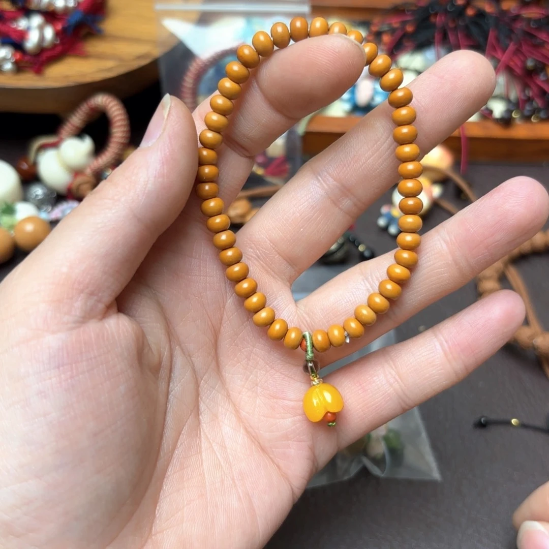 橄榄核吊坠成品的手链