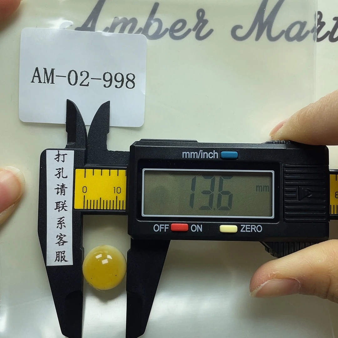 琥珀未镶嵌珠宝奇石瑕疵放漏定制打孔后不退换