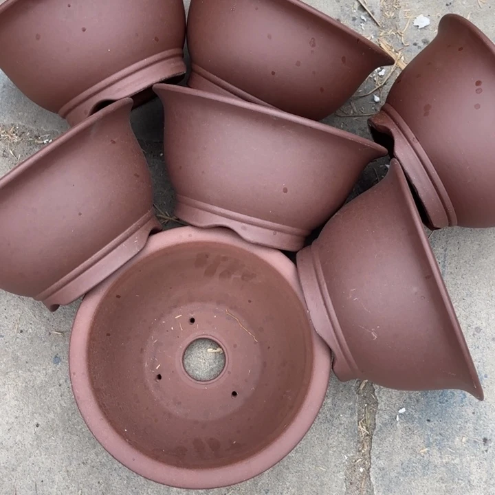 紫砂花盆100-7。  25-12