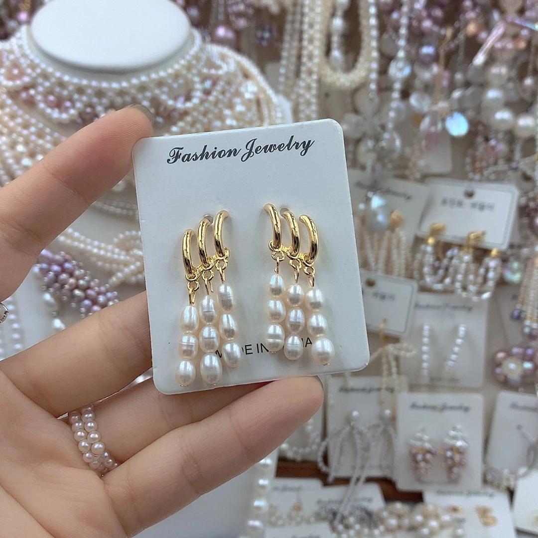 淡水珍珠银S925镶嵌耳饰