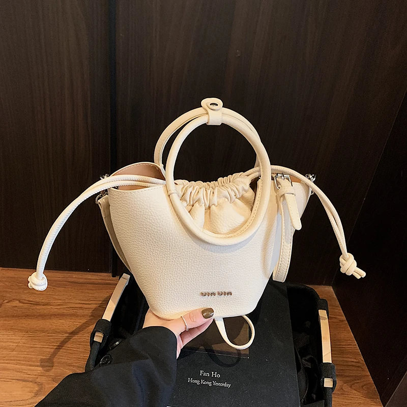 PARACVTOU/帕卡图耐磨小众时尚水桶包单肩斜挎包拉链百搭手提式包