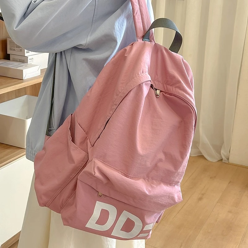 CKWU高颜值轻便双肩包女大容量高中生大学生背包休闲出行旅游包男