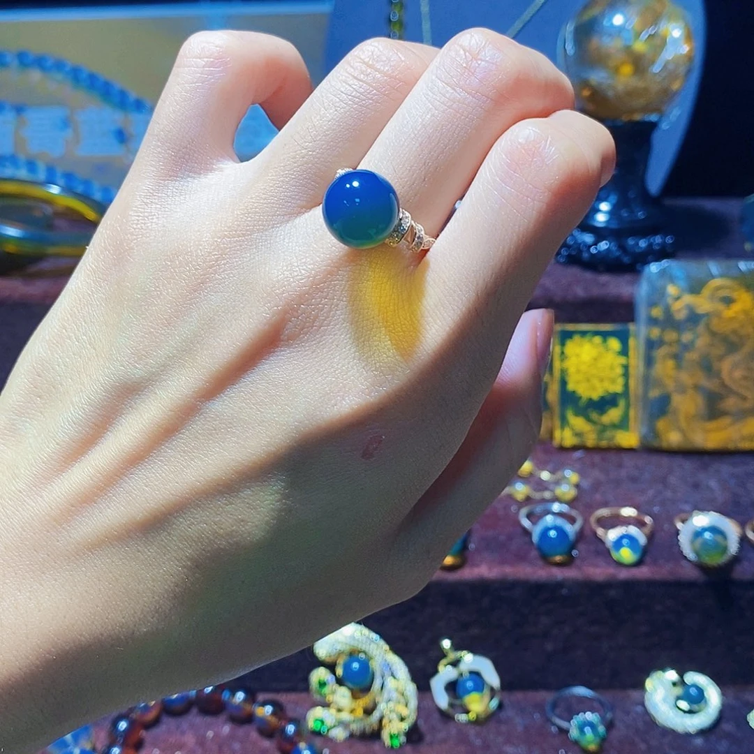 银S925镀金镶嵌蓝珀戒指11mm高蓝净水丝带款