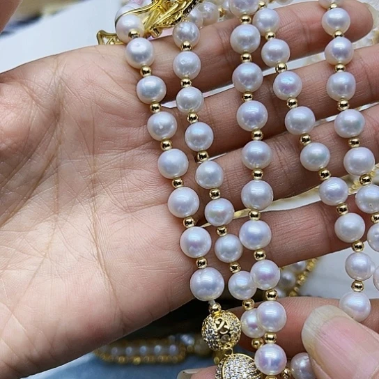 淡水珍珠胸饰银S925镶嵌弓***张