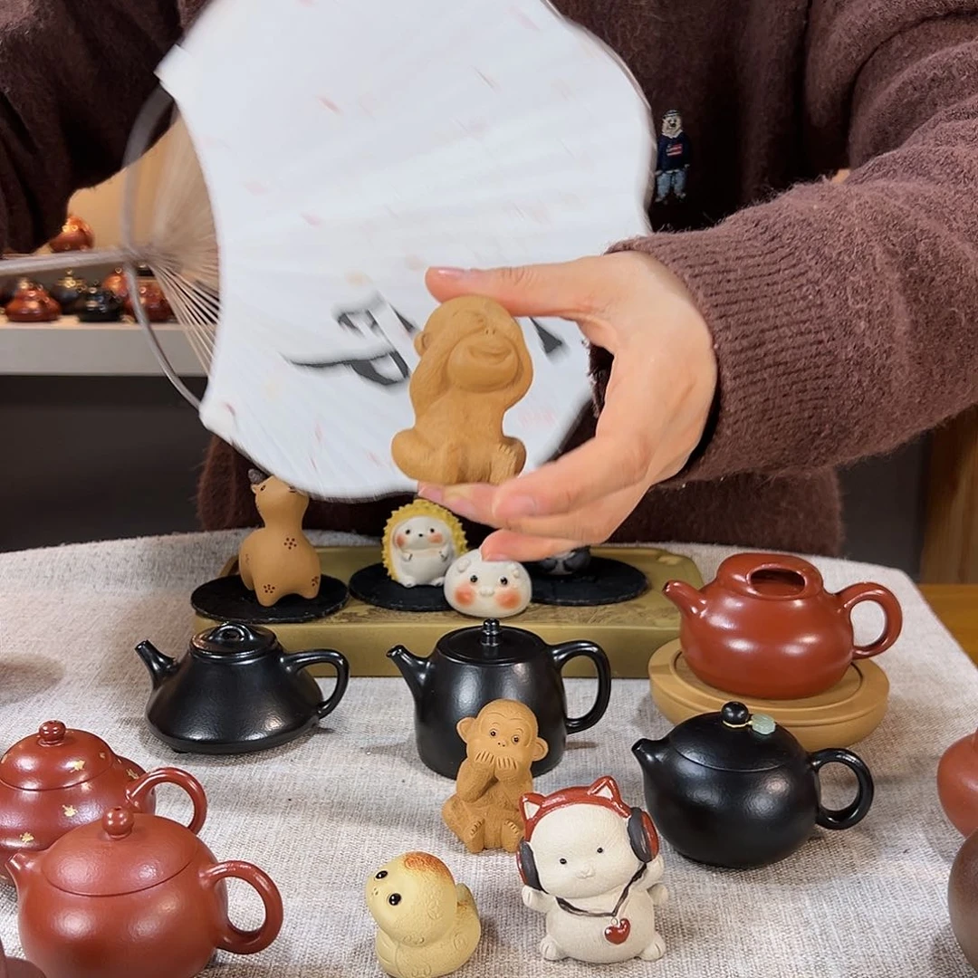 紫砂茶壶向***开我不看 猴子