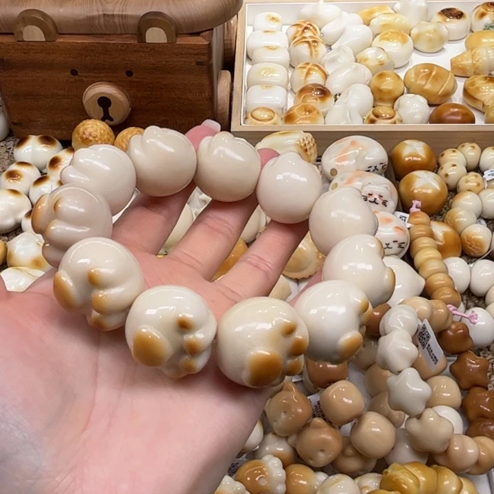 菩提根/象牙果把件12.12.24象牙果炭烤爱心猫爪微瑕