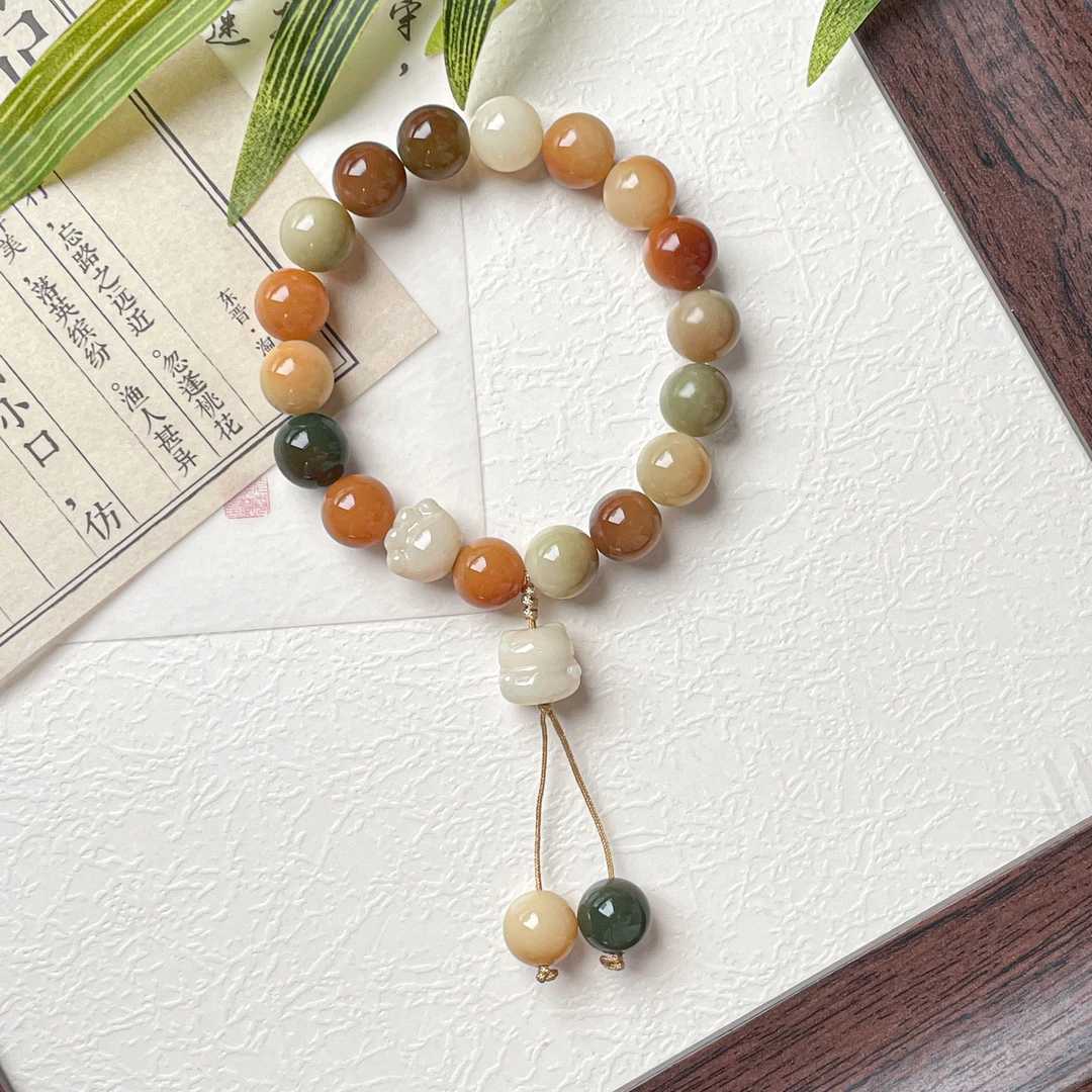 炭烧杂色圆珠栗香松果手串11mm      A-Z476055