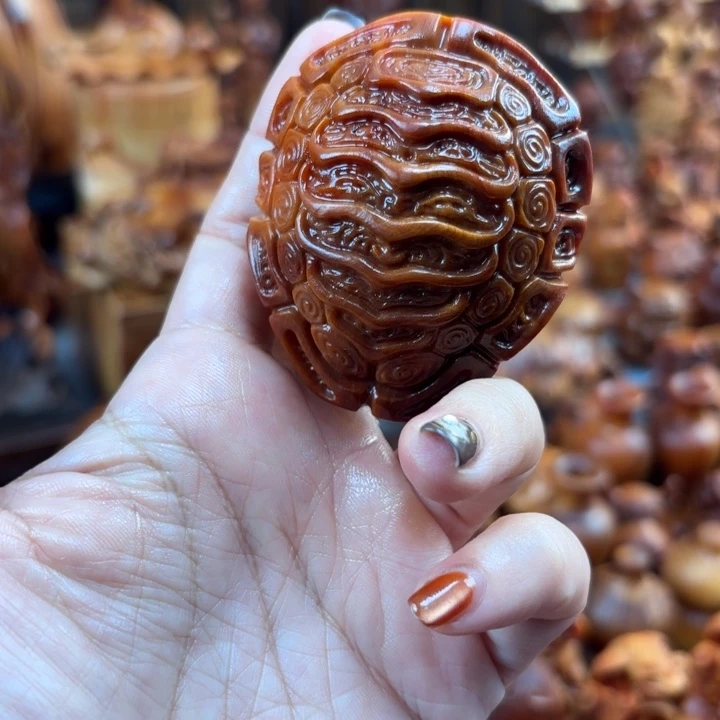 平***。太行崖柏手把件的设计和制作