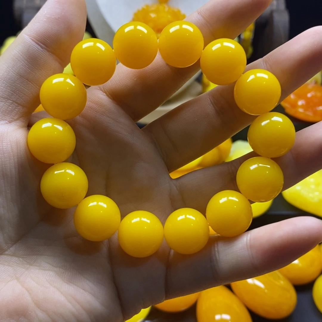 静***^非金属16鸡油黄手串