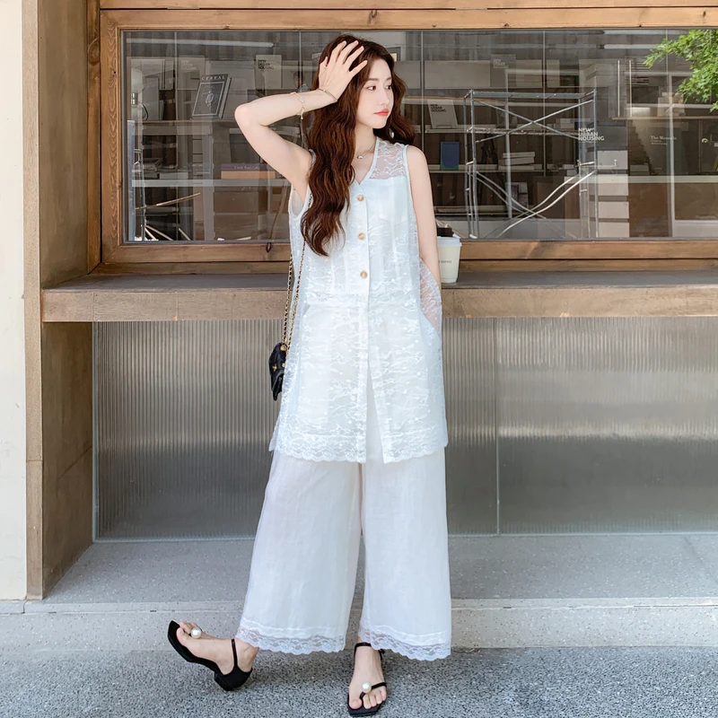 白色套装女夏季一整套今年流行蕾丝拼接无袖上衣九分阔腿裤两件套