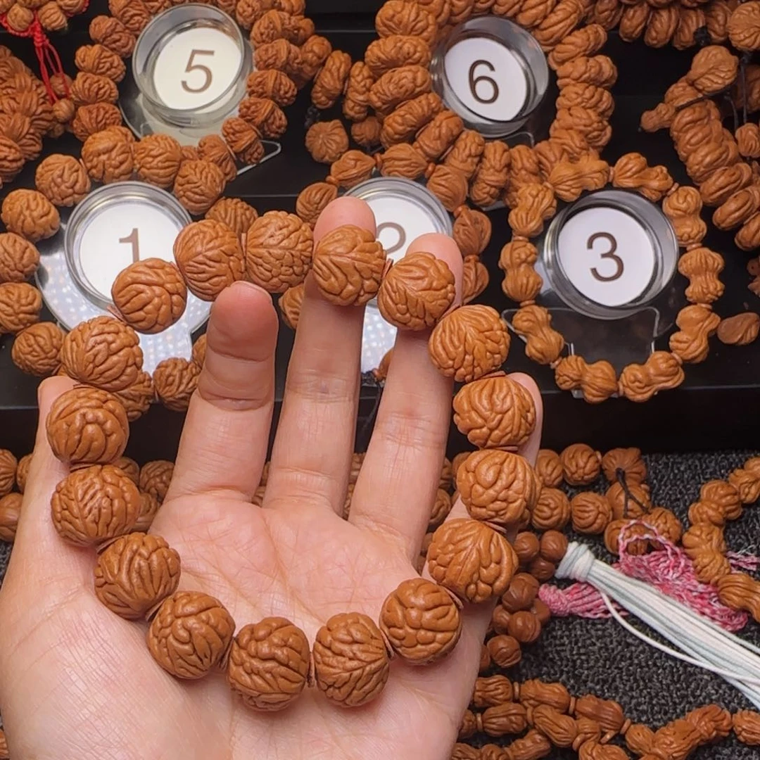 只***话桃核手串秦岭豹子