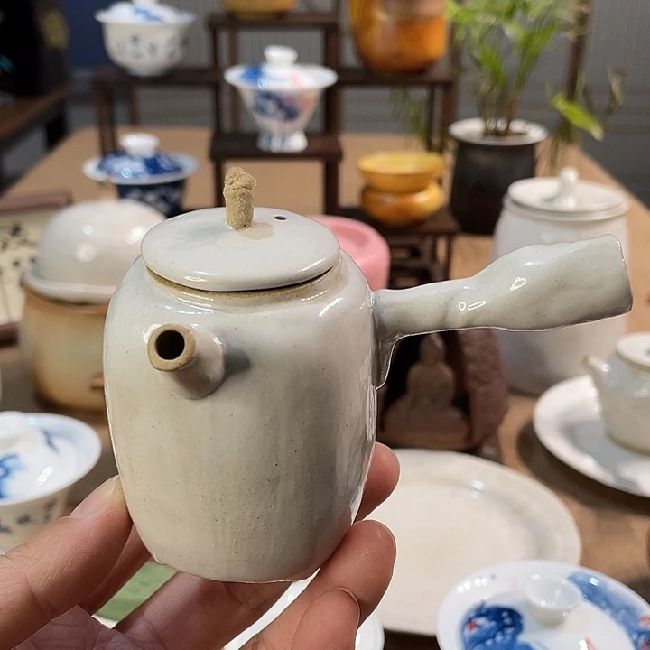 瓷片侧把壶好看的手捏的