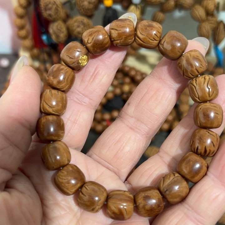风****精品桃枭光珠手串