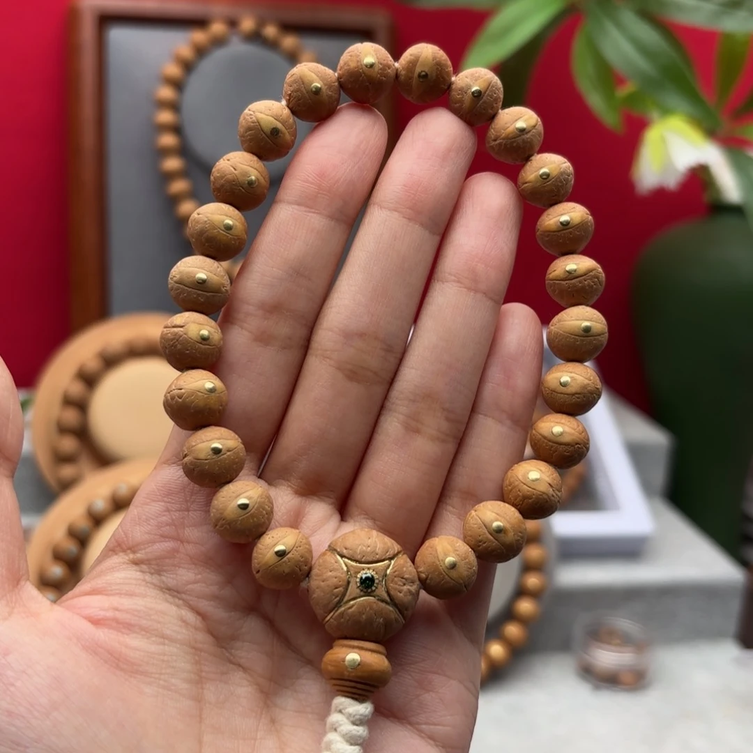 凤眼菩提手串文****齐11左右铜钉镶嵌手串