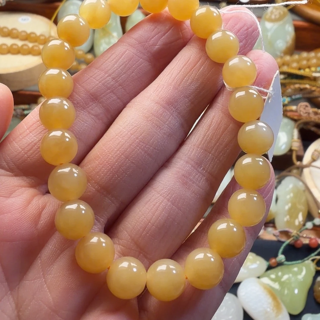 黄***风和田玉未镶嵌颈饰