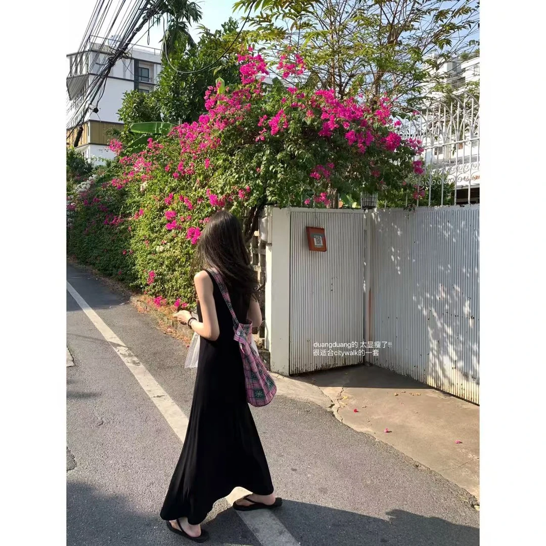 徐秋阳  耀黑女王 百搭时尚休闲设计感显瘦显白长裙90011