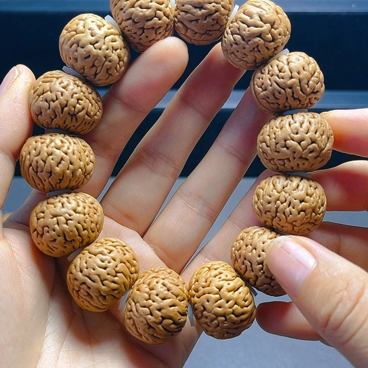 乐***爸桃核吊坠桃核手串