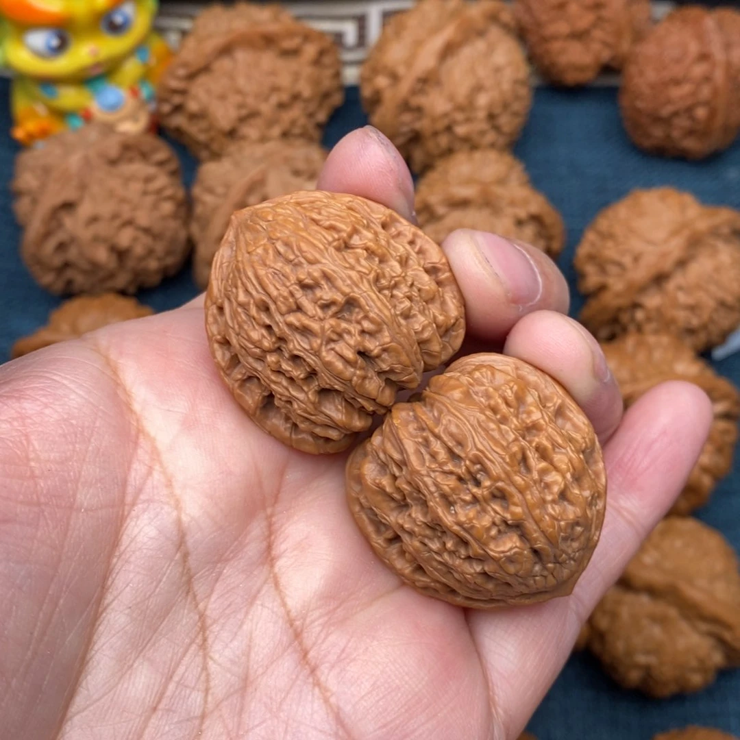 文玩核桃把件32红宝石狮子头