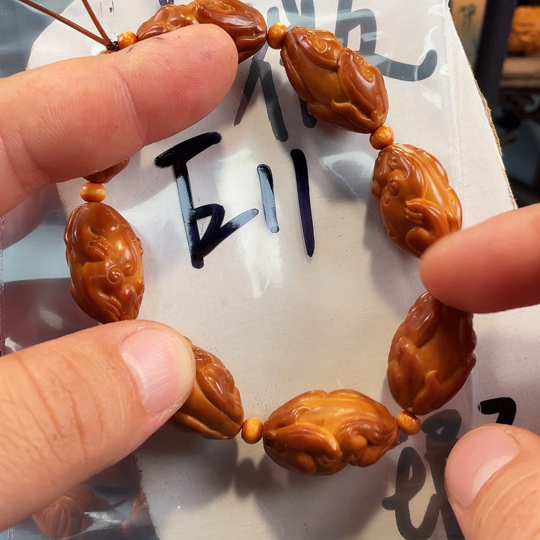 橄榄核其他橄榄核雕工艺手串 瑕疵介意勿拍