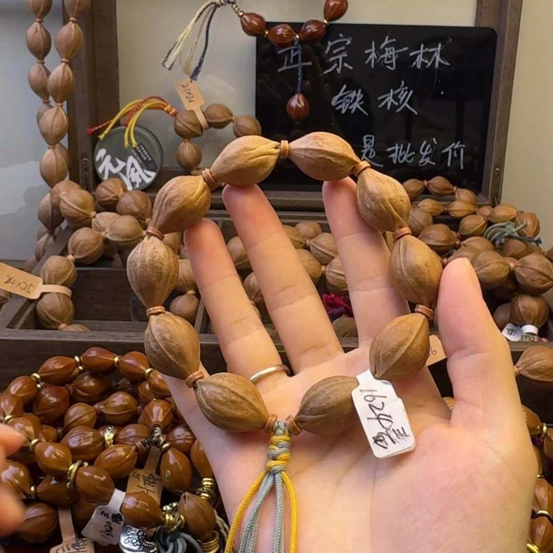 Z***手串橄榄核16.24三面佛