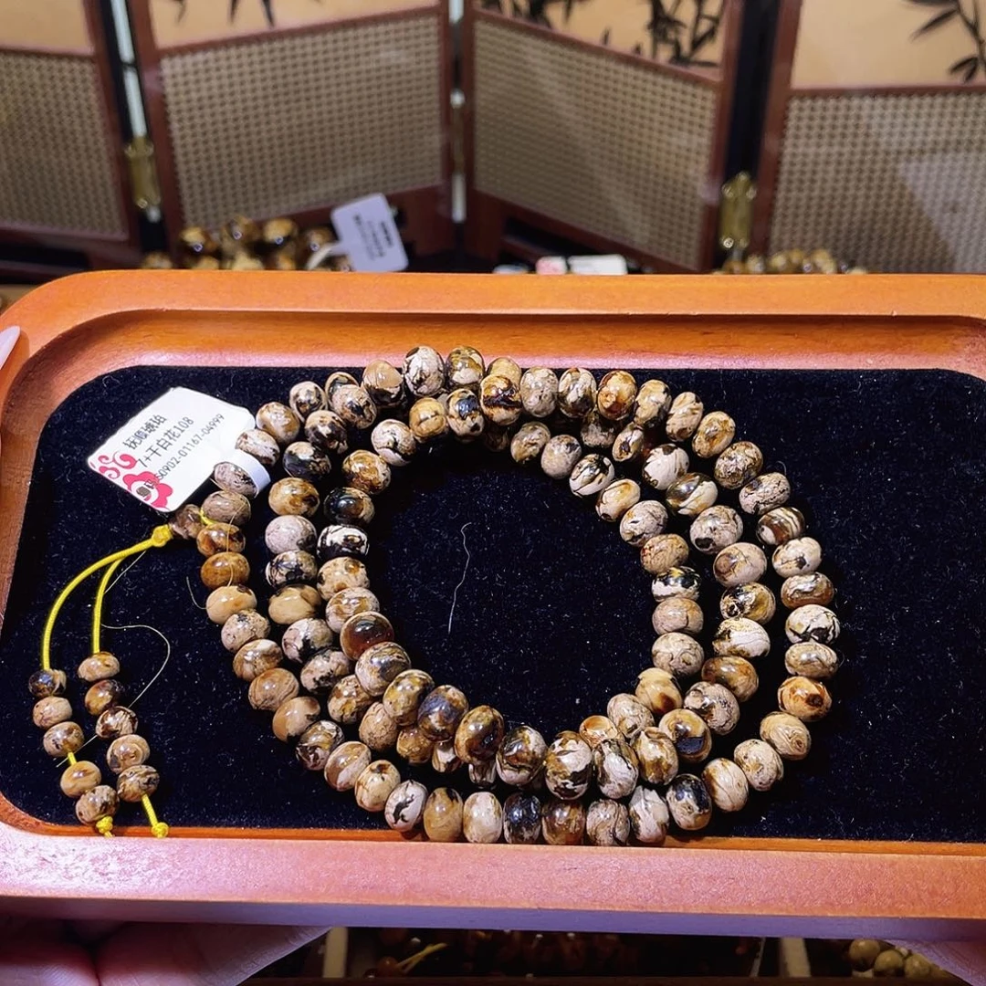 琥珀未镶嵌裸石抚顺琥珀7+干白花