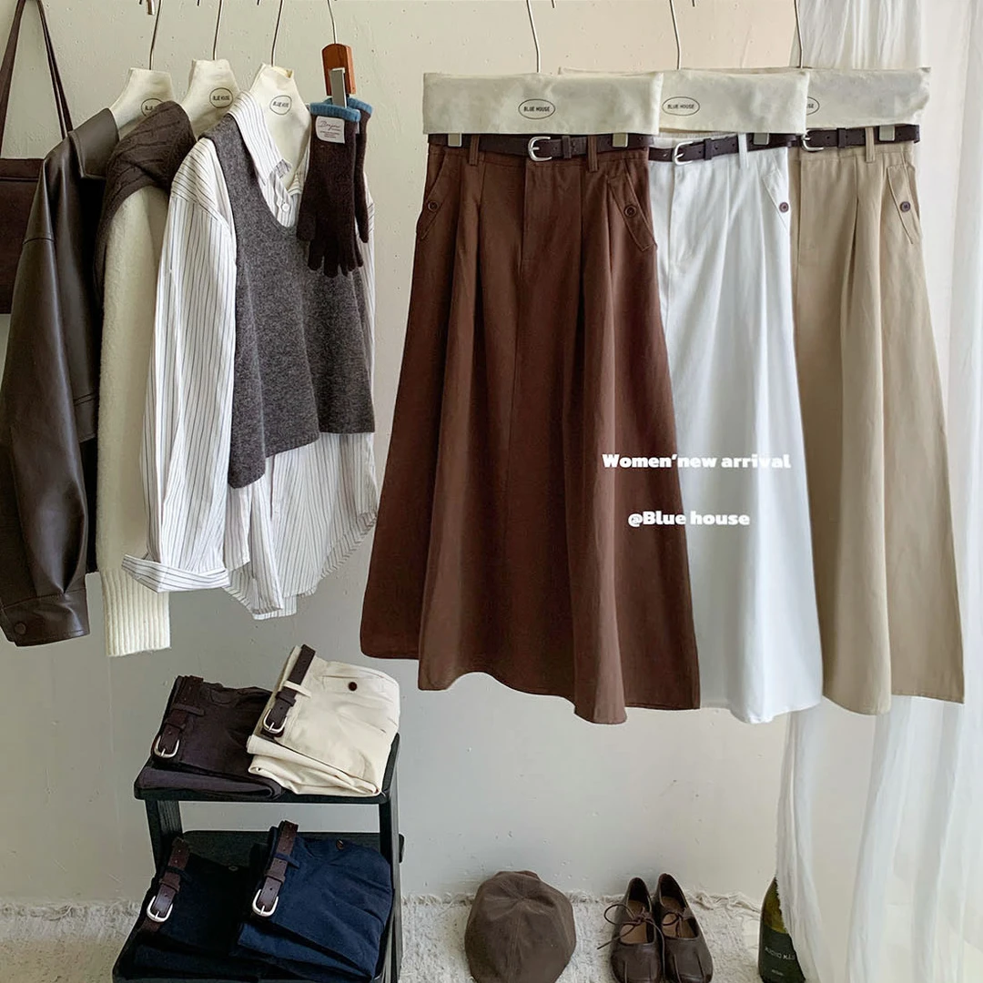 日系氛围双口袋洗水半身裙女秋简约高腰小纽扣中长A字遮胯伞裙