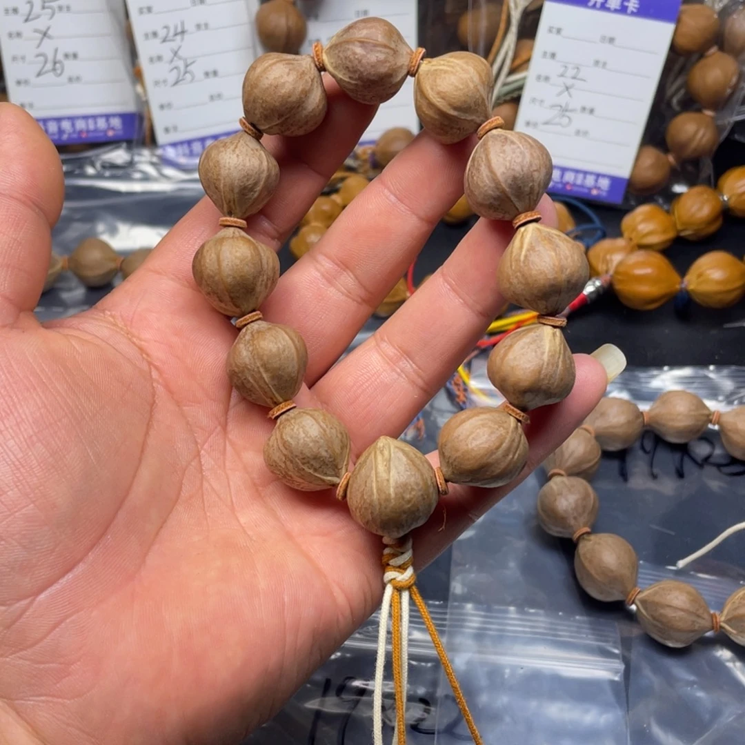 嘻***包橄榄核手串红肉19x20mm