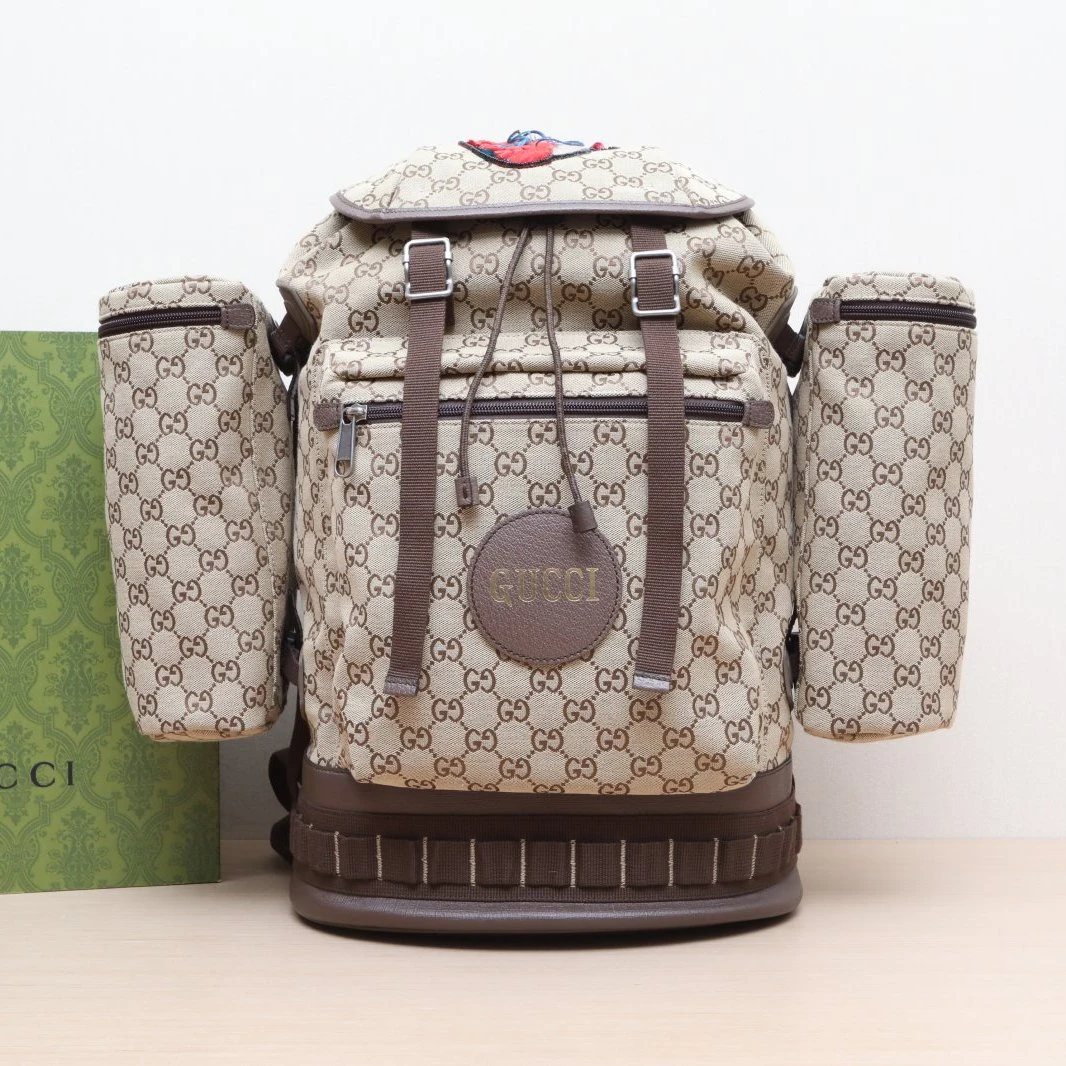 99新 GUCCI/古驰 小花黑黑 老花 帆布 秀款双肩包 背带镶钻