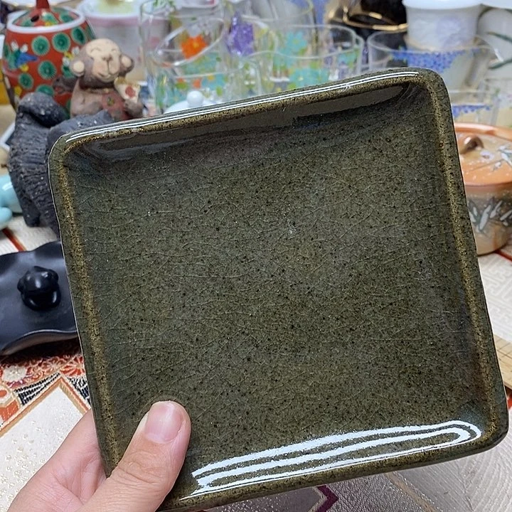 茶壶紫砂杯子的味道就好像被风压住在地上一