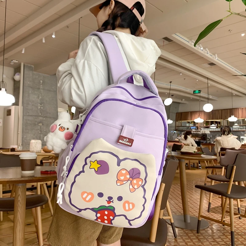 尼龙韩版双肩背包小学初中高中生书包女生百搭ins风可爱印花宽大