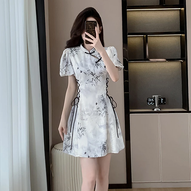 新中式连衣裙夏季新款改良旗袍泡泡抽绳袖收腰水墨画盘扣镂空短裙