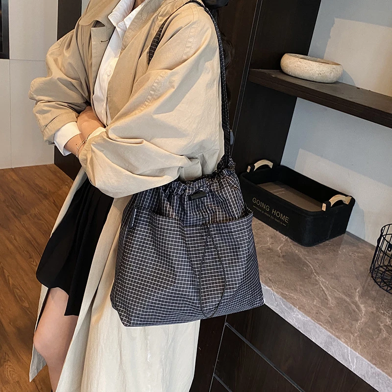 帆布大包包女2025新款时尚布包单肩包大容量托特包上课通勤斜挎包