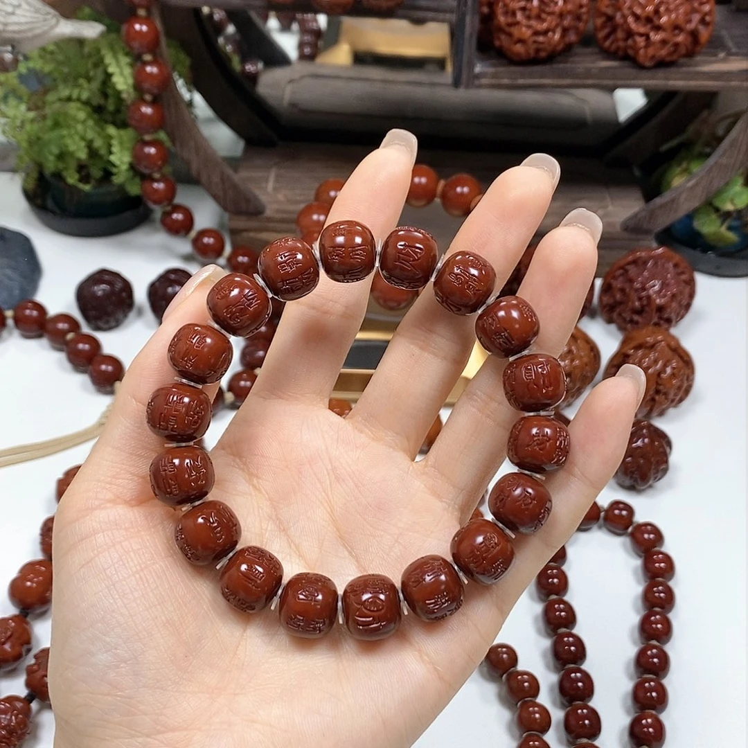 橄榄核把件故***百财手串