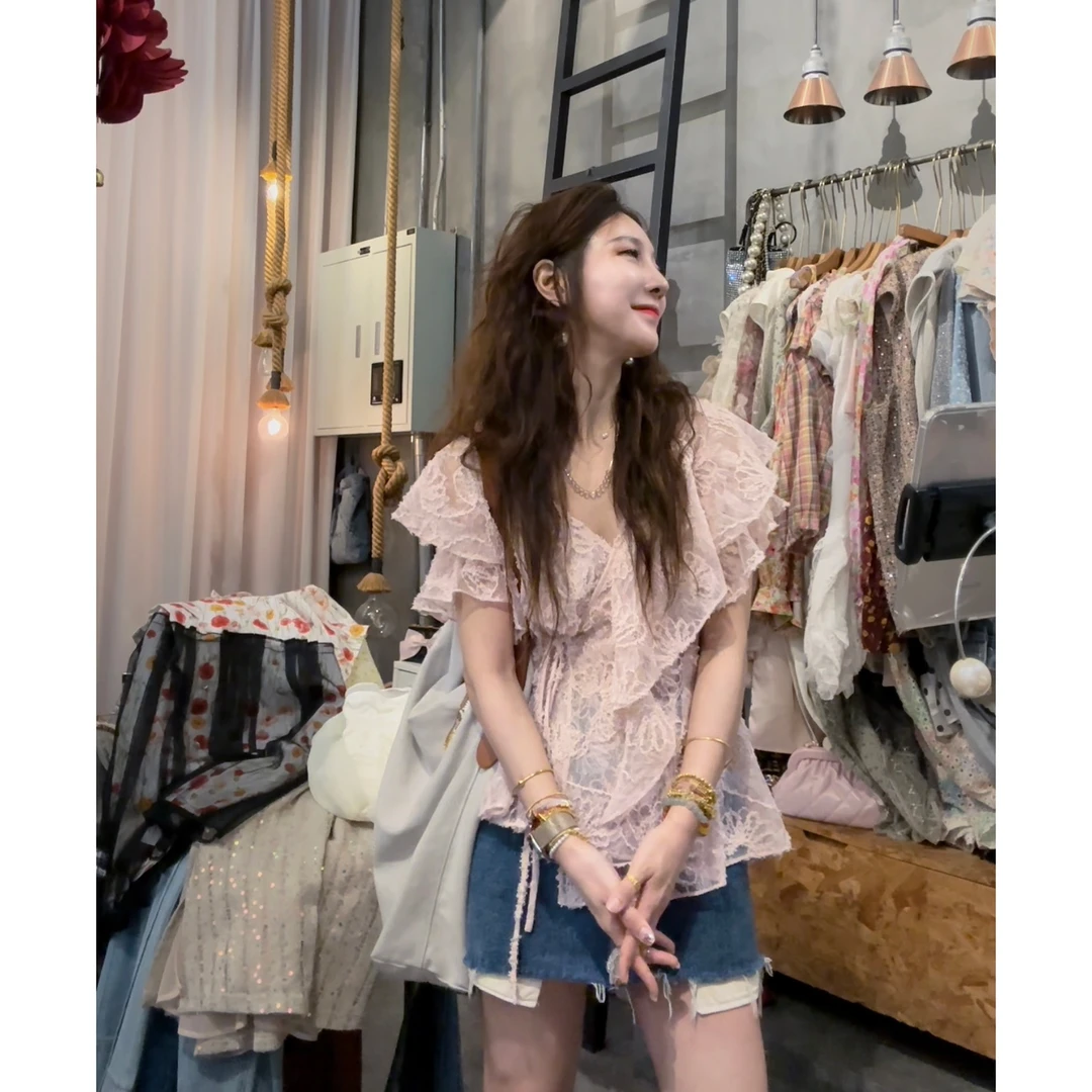 S50620988素拉那里 韩系立体提花刺绣蕾丝荷叶边不规则衬衣衬衫