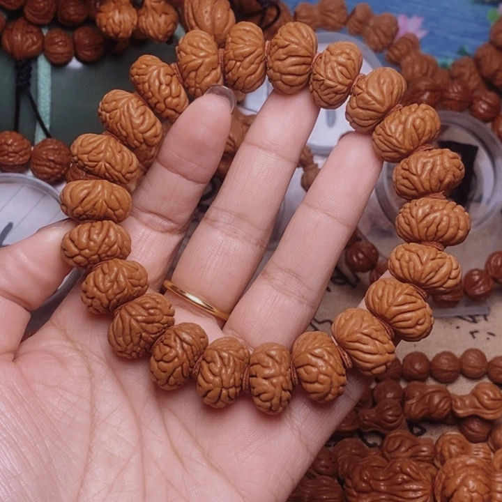 孙***智文玩核桃手串龙纹桃核